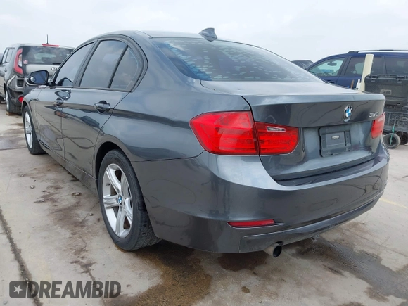 2013 BMW 3 Series 320i with VIN WBA3B1C53DK128602, listed as a IAAI auction lot 41952771 with 103,564 mi miles and . Bid and sale history available at carsss.com. Image 3.