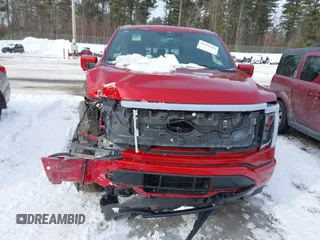2023 Ford F-150 Lightning Pro with VIN 1FT6W1EV2PWG16485, listed as a IAAI auction lot 41496664 with 7,171 mi miles and . Bid and sale history available at DreamBid. Image 12.