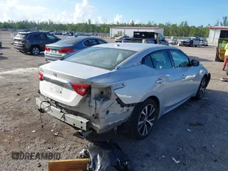 2018 Nissan Maxima SV with VIN 1N4AA6AP8JC378167, listed as a IAAI auction lot 42531215 with 93,060 mi miles and . Bid and sale history available at DreamBid. Image 4.