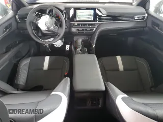 2025 Toyota Camry LE z VIN 4T1DAACK9SU164954, wystawiony jako Copart lot #60821285 z przebiegiem 9 924 mil mil oraz Szkoda całkowita • Salvage title. Historia ofert i sprzedaży dostępna na DreamBid. Obrazek 8.