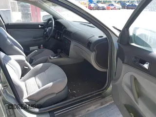 2004 Volkswagen Passat GLS z VIN WVWVD63BX4E011218, wystawiony jako IAAI lot #41308619 z przebiegiem 178 579 mil mil oraz . Historia ofert i sprzedaży dostępna na DreamBid. Obrazek 5.