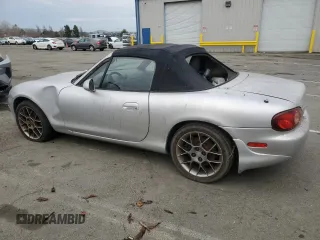 2004 Mazda MX-5 Miata LS with VIN JM1NB353440402453, listed as a Copart auction lot 45064475 with 151,508 mi miles and Salvage title. Bid and sale history available at DreamBid. Image 2.