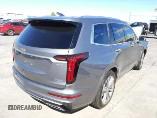 2020 Cadillac XT6 FWD Premium Luxury z VIN 1GYKPERS0LZ126231, wystawiony jako Copart lot #60293642 z przebiegiem 43 187 mil mil oraz . Historia ofert i sprzedaży dostępna na DreamBid. Obrazek 4.