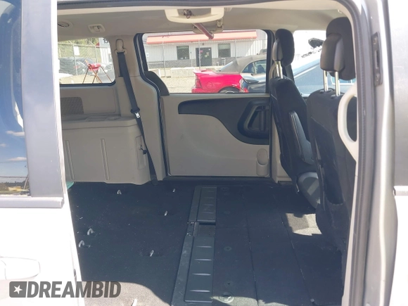 2016 Dodge Grand Caravan SE with VIN 2C4RDGBGXGR220549, listed as a IAAI auction lot 42074110 with 114,826 mi miles and . Bid and sale history available at DreamBid. Image 8.