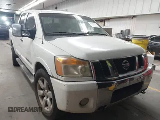2009 Nissan Titan SE with VIN 1N6AA07C79N318731, listed as a IAAI auction lot 41798837 with 255,742 mi miles and . Bid and sale history available at DreamBid. Image 1.