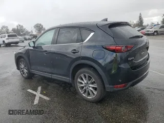 2020 Mazda CX-5 Grand Touring with VIN JM3KFADM3L0815055, listed as a Copart auction lot 48175245 with 56,602 mi miles and Salvage Title. Bid and sale history available at carsss.com. Image 2.