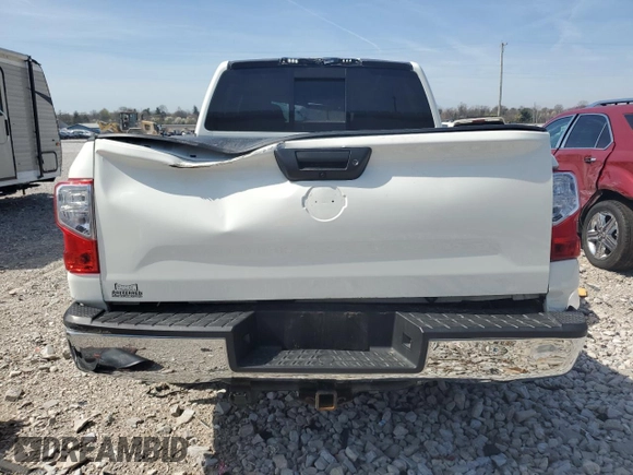 2018 Nissan Titan SV z VIN 1N6AA1EJ7JN542996, wystawiony jako Copart lot #50969835 z przebiegiem 89 664 mil mil oraz Szkoda całkowita • Salvage title. Historia ofert i sprzedaży dostępna na DreamBid. Obrazek 6.