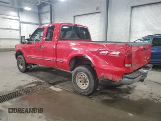 1999 Ford Super Duty F-250 XL with VIN 1FTNX21F1XEA88070, listed as a Copart auction lot 70012924 with 286,161 mi miles and Salvage Title. Bid and sale history available at carsss.com. Image 2.