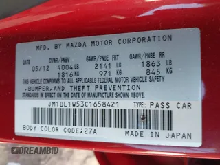 2012 Mazda 3 S Grand Touring with VIN JM1BL1W53C1658421, listed as a IAAI auction lot 41294572 with 100,875 mi miles and . Bid and sale history available at DreamBid. Image 9.