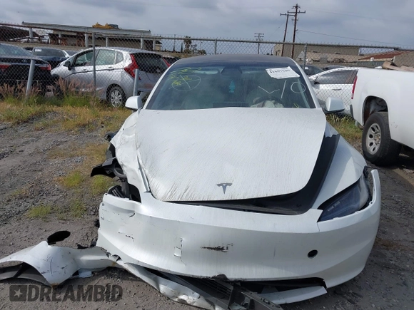 2024 Tesla Model 3 Long Range with VIN 5YJ3E1EB7RF854092, listed as a IAAI auction lot 41697646 with 7,371 mi miles and . Bid and sale history available at DreamBid. Image 12.