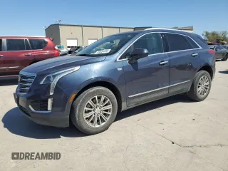 2019 Cadillac XT5 Luxury FWD with VIN 1GYKNCRS1KZ131818, listed as a Copart auction lot 49354595 with 131,995 mi miles and Salvage Title. Bid and sale history available at DreamBid. Image 1.