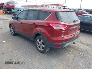 2014 Ford Escape SE with VIN 1FMCU0GX2EUB60526, listed as a IAAI auction lot 42060469 with 128,796 mi miles. Bid and sale history available at carsss.com. Image 3.