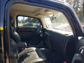 2007 Hummer H3 SUV with VIN 5GTDN13E378169059, listed as a IAAI auction lot 42201940 with 150,487 mi miles. Bid and sale history available at carsss.com. Image 5.