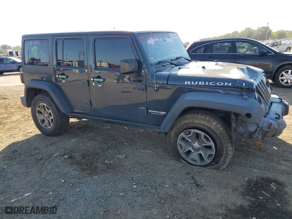 2018 Jeep Wrangler JK Unlimited Rubicon with VIN 1C4BJWFG9JL840582, listed as a Copart auction lot 73064054 with 47,590 mi miles and Salvage Title. Bid and sale history available at carsss.com. Image 4.
