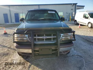 1997 Ford Explorer XL with VIN 1FMDU34E5VZB40878, listed as a Copart auction lot 84009744 with 185,047 mi miles and Salvage title. Bid and sale history available at DreamBid. Image 5.