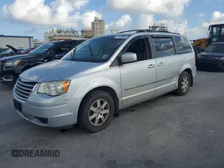 2010 Chrysler Town & Country Touring with VIN 2A4RR5DXXAR137658, listed as a Copart auction lot 72443994 with 101,934 mi miles and Salvage Title. Bid and sale history available at DreamBid. Image 1.