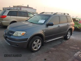 2005 Mitsubishi Outlander XLS with VIN JA4LX41F75U022428, listed as a IAAI auction lot 40293668 with 190,917 mi miles. Bid and sale history available at carsss.com. Image 2.