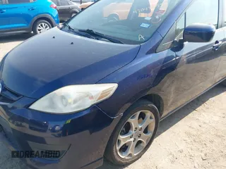 2010 Mazda 5 Sport with VIN JM1CR2W34A0380817, listed as a IAAI auction lot 42047595 with 189,592 mi miles. Bid and sale history available at carsss.com. Image 6.