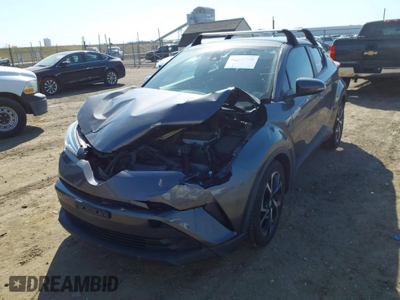 2019 Toyota C-HR XLE with VIN JTNKHMBX4K1025527, listed as a IAAI auction lot 41807738 with 64,505 mi miles and . Bid and sale history available at DreamBid. Image 18.