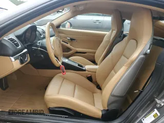 2015 Porsche Cayman с VIN WP0AA2A83FK162056, выставлен на аукционе Copart как лот 71223934 с пробегом 79 871 миль миль и Списание • Salvage title. История ставок и продаж доступна на DreamBid. Изображение 7.