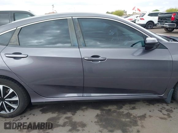 2017 Honda Civic LX with VIN 19XFC2F50HE055888, listed as a IAAI auction lot 42202494 with 147,354 mi miles and . Bid and sale history available at DreamBid. Image 13.