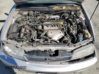 1997 Honda Accord EX with VIN 1HGCD5667VA025961, listed as a Copart auction lot 72125824 with 242,047 mi miles and Salvage Title. Bid and sale history available at carsss.com. Image 11.