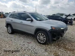 2019 Jeep Cherokee Latitude with VIN 1C4PJLCB3KD164896, listed as a Copart auction lot 64172205 with 107,433 mi miles and Salvage title. Bid and sale history available at DreamBid. Image 4.