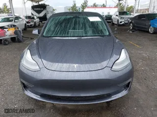 2021 Tesla Model 3 Long Range with VIN 5YJ3E1EB8MF936695, listed as a IAAI auction lot 41778553 with 50,732 mi miles. Bid and sale history available at carsss.com. Image 11.