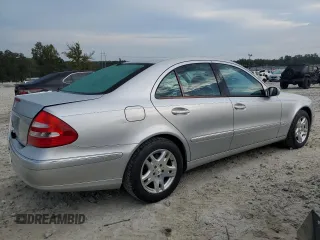 2003 Mercedes-Benz E-Class 3.2L with VIN WDBUF65J93A087012, listed as a Copart auction lot 67157614 with 146,985 mi miles and Salvage Title. Bid and sale history available at carsss.com. Image 3.