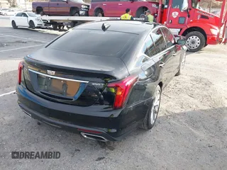 2022 Cadillac CT5 Premium Luxury z VIN 1G6DN5RK8N0118974, wystawiony jako IAAI lot #41265623 z przebiegiem 40 568 mil mil oraz . Historia ofert i sprzedaży dostępna na DreamBid. Obrazek 4.
