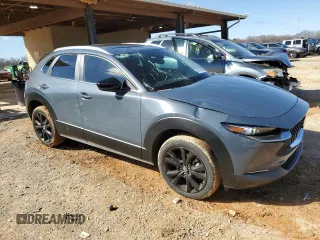 2022 Mazda CX-30 S Carbon Edition with VIN 3MVDMBCL0NM455876, listed as a Copart auction lot 48141545 with 11,873 mi miles and Salvage title. Bid and sale history available at DreamBid. Image 4.