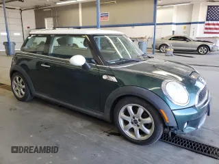 2007 MINI Hardtop S with VIN WMWMF73507TT80236, listed as a Copart auction lot 53049755 with 98,354 mi miles and Salvage Title. Bid and sale history available at DreamBid. Image 4.