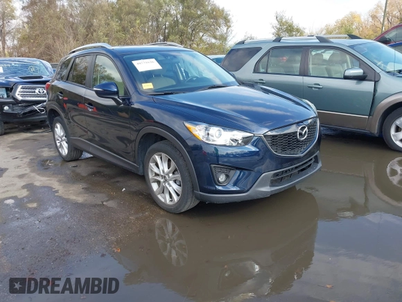 2015 Mazda CX-5 Grand Touring with VIN JM3KE4DY7F0478823, listed as a IAAI auction lot 40731626 with 82,884 mi miles. Bid and sale history available at carsss.com. Image 1.