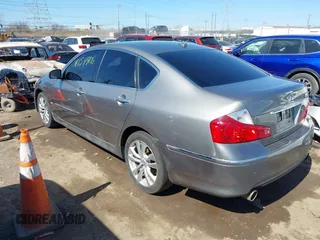 2010 Infiniti M with VIN JN1CY0AR7AM960352, listed as a IAAI auction lot 41754408 with 227,408 mi miles. Bid and sale history available at carsss.com. Image 3.