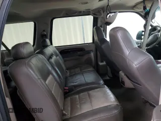 2003 Ford Excursion z VIN 1FMNU44S03ED68257, wystawiony jako Copart lot #88008655 z przebiegiem 242 751 mil mil oraz Czysty tytuł • Clean title. Historia ofert i sprzedaży dostępna na DreamBid. Obrazek 11.