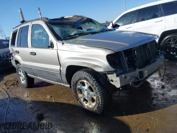 2001 Jeep Grand Cherokee Laredo with VIN 1J4GX48S51C735316, listed as a IAAI auction lot 41752349 with 214,101 mi miles and . Bid and sale history available at DreamBid. Image 1.