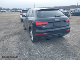 2018 Audi Q3 Premium Plus with VIN WA1JCCFS9JR033902, listed as a IAAI auction lot 41617460 with 97,771 mi miles. Bid and sale history available at carsss.com. Image 3.