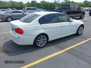 2011 BMW 3 Series 328i xDrive with VIN WBAPK5C51BF124871, listed as a IAAI auction lot 42081999 with 129,120 mi miles. Bid and sale history available at carsss.com. Image 4.