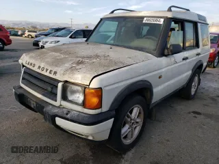 2000 Land Rover Discovery Cloth z VIN SALTY1543YA273374, wystawiony jako Copart lot #86026964 z przebiegiem 115 114 mil mil oraz Czysty tytuł • Clean title. Historia ofert i sprzedaży dostępna na DreamBid. Obrazek 1.