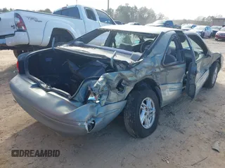 1997 Ford Thunderbird LX with VIN 1FALP6242VH127682, listed as a IAAI auction lot 41088946 with 88,769 mi miles and . Bid and sale history available at DreamBid. Image 4.