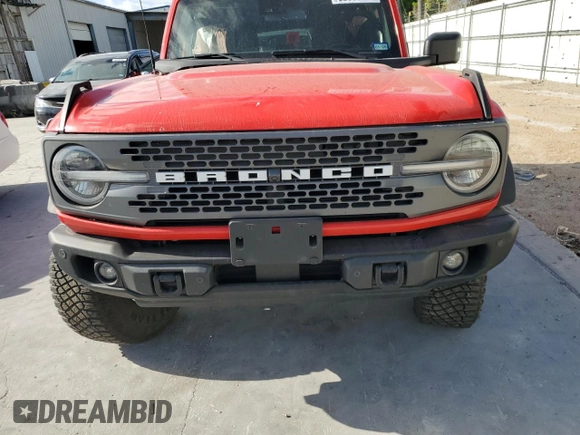 2023 Ford Bronco z VIN 1FMEE5DP6PLC01420, wystawiony jako Copart lot #52883195 z przebiegiem 11 620 mil mil oraz Szkoda całkowita • Salvage title. Historia ofert i sprzedaży dostępna na DreamBid. Obrazek 5.
