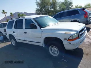 1999 Dodge Durango z VIN 1B4HS28Y1XF619973, wystawiony jako IAAI lot #42399672 z przebiegiem 192 812 mil mil oraz . Historia ofert i sprzedaży dostępna na DreamBid. Obrazek 13.
