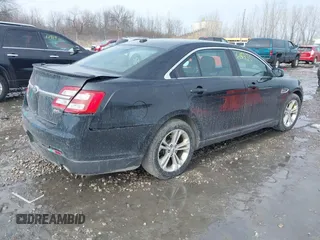 2013 Ford Taurus SEL with VIN 1FAHP2E86DG135835, listed as a IAAI auction lot 41665430 with 130,816 mi miles. Bid and sale history available at carsss.com. Image 4.
