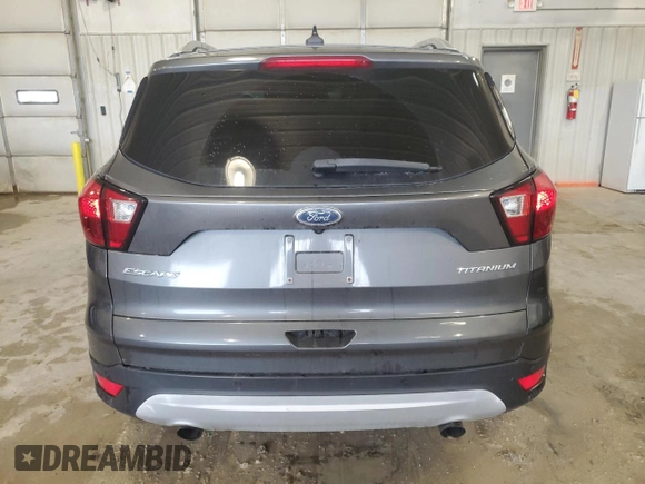 2019 Ford Escape Titanium with VIN 1FMCU0J91KUC02268, listed as a Copart auction lot 54150445 with 165,897 mi miles and Salvage title. Bid and sale history available at DreamBid. Image 6.