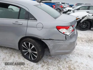 2013 Chrysler 200 Limited with VIN 1C3CCBCG2DN592782, listed as a IAAI auction lot 41471739 with 103,079 mi miles and . Bid and sale history available at DreamBid. Image 6.