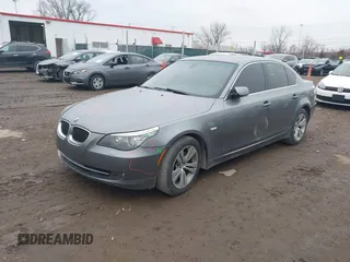 2009 BMW 5 Series 528i with VIN WBANU53549C121735, listed as a IAAI auction lot 41536727 with 157,813 mi miles and . Bid and sale history available at carsss.com. Image 2.