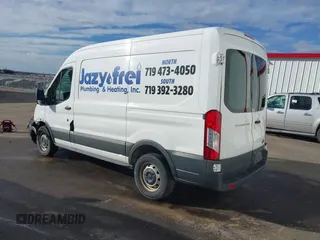 2017 Ford Transit with VIN 1FTYR1CM6HKA89795, listed as a IAAI auction lot 41654927 with 96,489 mi miles and . Bid and sale history available at DreamBid. Image 3.