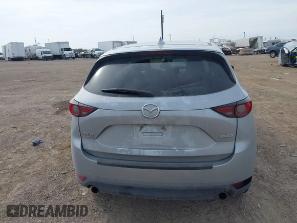 2017 Mazda CX-5 Grand Touring with VIN JM3KFBDL8H0227348, listed as a IAAI auction lot 41572377 with 124,908 mi miles. Bid and sale history available at carsss.com. Image 16.