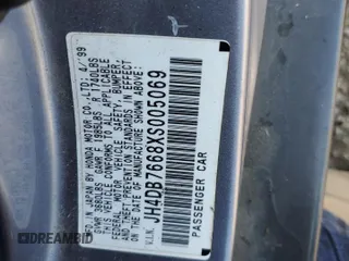 1999 Acura Integra z VIN JH4DB7668XS005069, wystawiony jako Copart lot #61384394 z przebiegiem 207 353 mil mil oraz Szkoda całkowita • Salvage title. Historia ofert i sprzedaży dostępna na DreamBid. Obrazek 12.