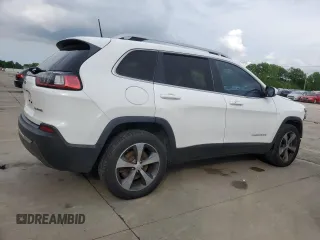 2019 Jeep Cherokee Limited with VIN 1C4PJMDX2KD409798, listed as a Copart auction lot 56913685 with 59,299 mi miles and Salvage title. Bid and sale history available at DreamBid. Image 3.